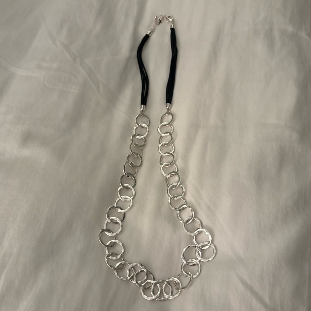 Long silver chain necklaces place with black cord adjustable